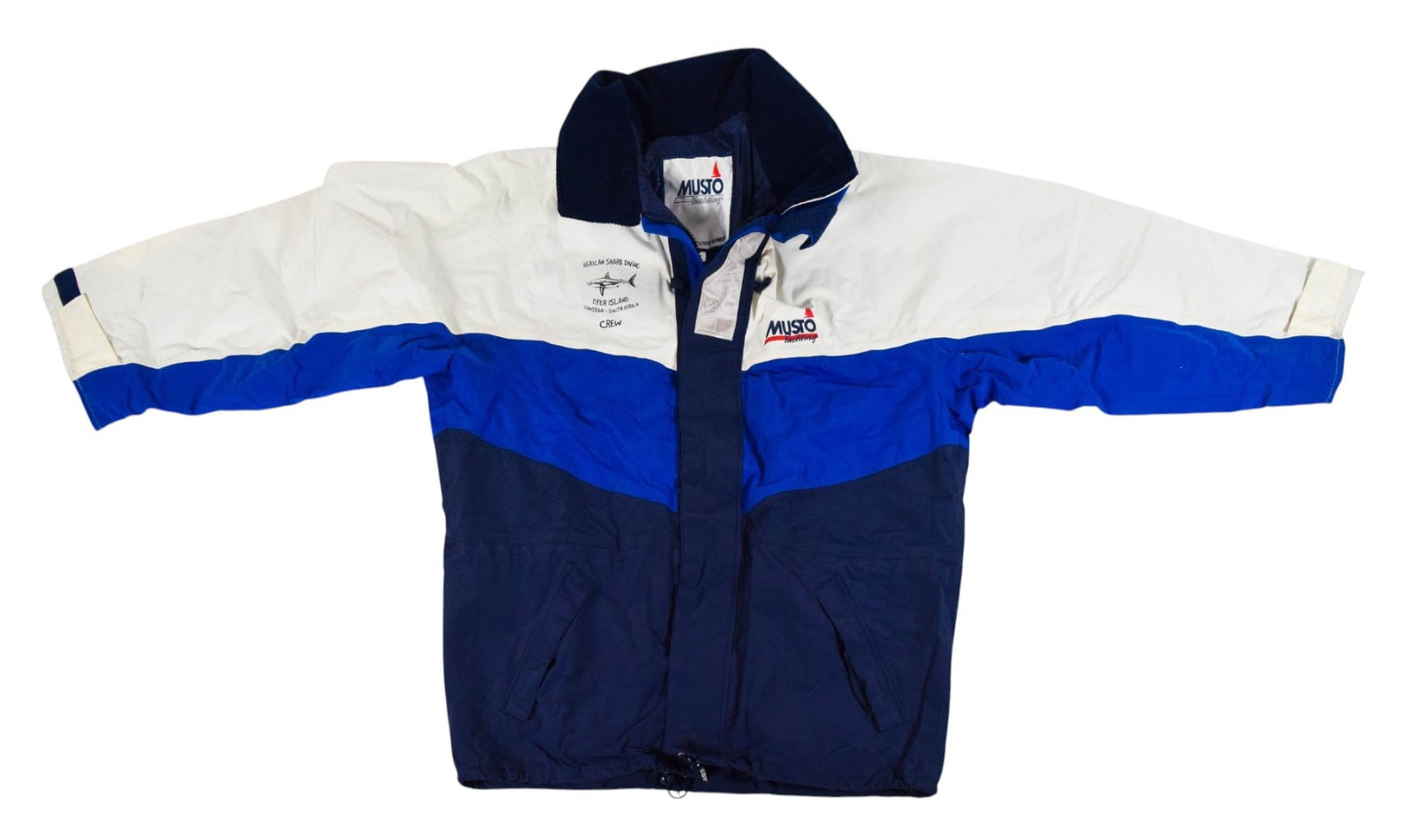 Peter Benchley's South African Shark Diving Crew Jacket: Diving crew jacket from the personal collection of author and marine conservation advocate Peter Benchley. Marked "African Shark Diving, Dyer Island, Gansbaai - South Africa" and "Crew." The vintage t