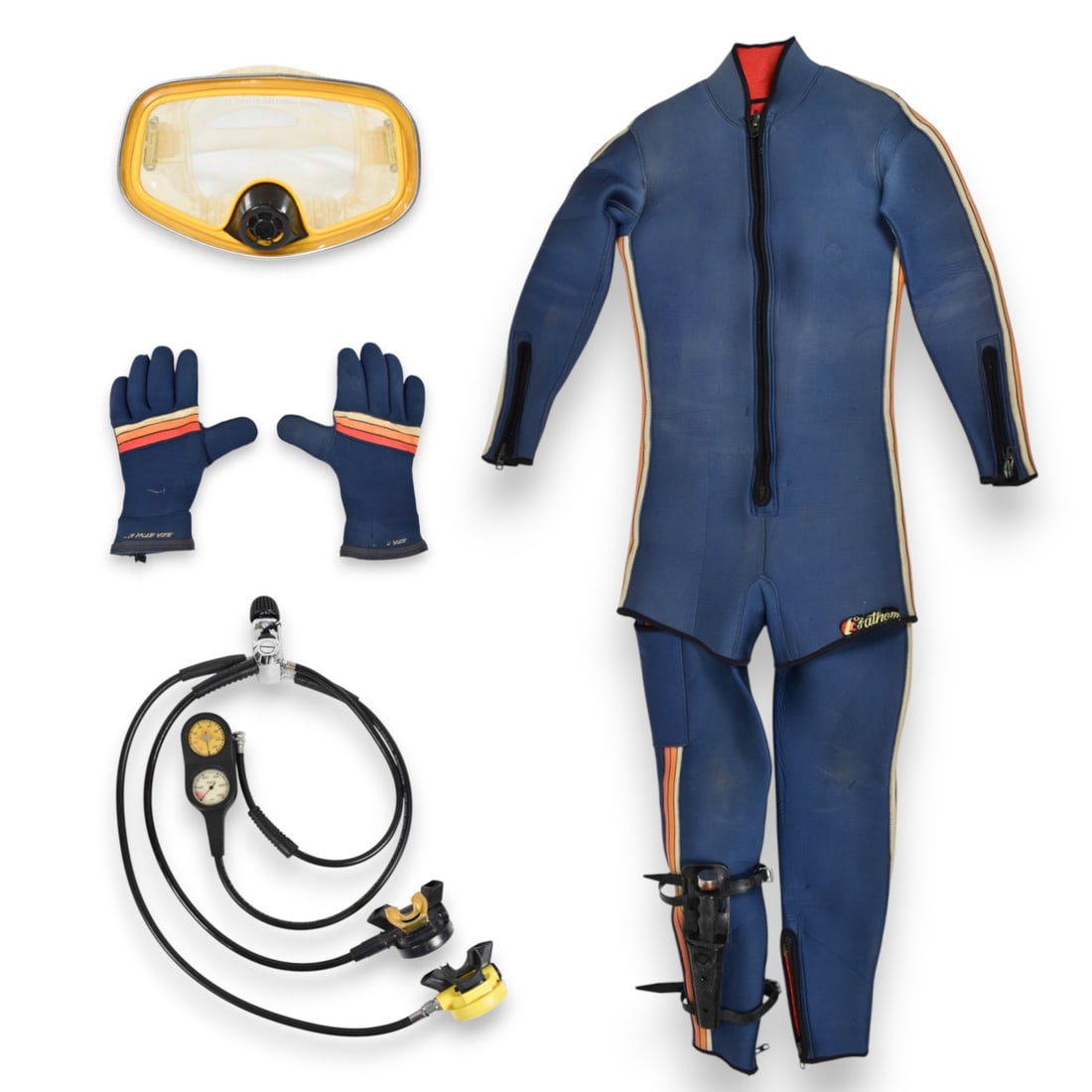 Peter Benchley's Vintage U.S. Divers and Fathom Scuba Diving Gear Ensemble: Vintage scuba diving ensemble featuring a two-piece neoprene wetsuit and assorted gear. The wetsuit, branded Fathom, consists of a sleeveless Farmer John style jumpsuit and a matching long-sleeve shor