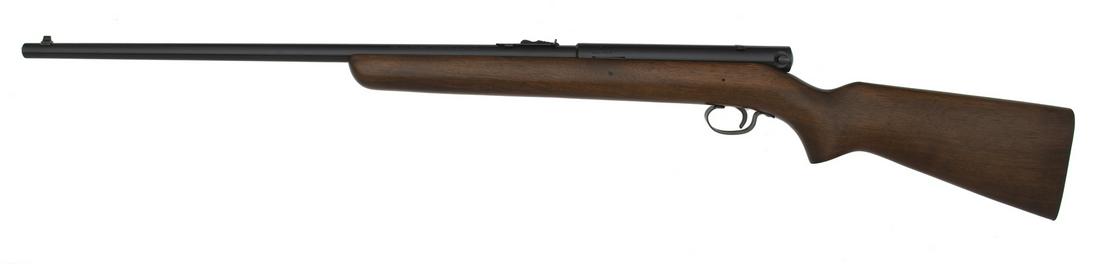 Winchester Model 74 Rifle: .22 caliber, 22" barrel, S/N 398046A, Blue finish, walnut stock. **This rifle is nearly new, retaining all of the original blue finish. Walnut stock has nice open-grained wood. Excellent bore.**