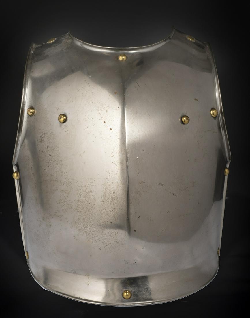 French Cuirassier Breastplate: 21.25" x 14". Heavy steel construction with brass rivets. Arsenal date and markings obscured by age, though a faint "1 L No 730I" is visible. Shoulder flanges marked with "1833" and "744/391". **Very 