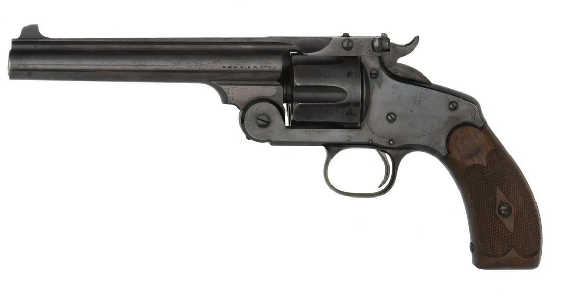 Smith and Wesson New Model 3 Target Pistol: .44 S&W caliber, 6" barrel with target sights, S/N 34096. Blue finish with checkered walnut grips. **Retaining most of the original blue finish with a little flaking on the blackstrap. Triggerguard an