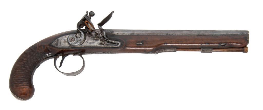 English Flintlock Pistol by Wheeler: .65 caliber, 10" octagonal smoothbore barrel, NSN. Steel finish with varnished walnut full stock checkered at wrist. Iron fittings. Inset German silver front sight with block rear sight; top of ba