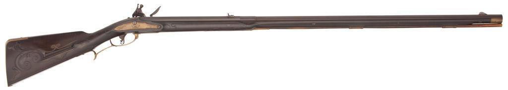 Flintlock Rifle by Jack Haugh presented to Wife Barbra: .40 caliber, 37" octagonal to round barrel. Barrel was made by the famous barrel maker Wm "Bill" Large. Six land groove rifling. German silver blade front sight mounted in a silver ova;l, 