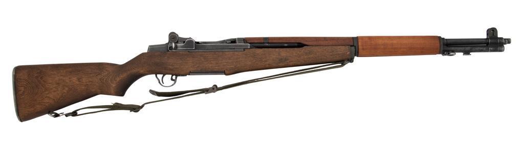 **World War II Winchester U.S. M1 Garand Rifle: .30-06 caliber, 24" barrel, S/N 1215466 (ca. 1942). Parkerized finish with walnut stock. Barrel shows 1946 Springfield production markings, with trigger group showing post-war Springfield markings
