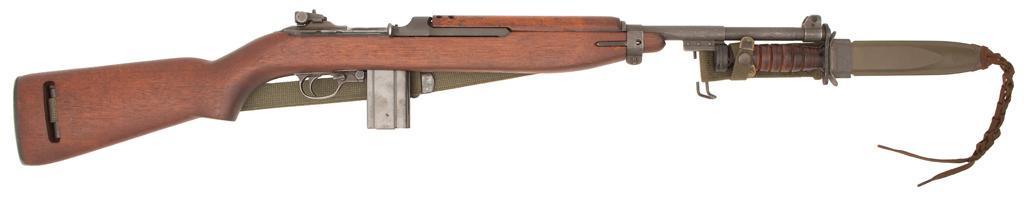 **IBM US M1 Carbine: .30 carbine caliber, 18" barrel, S/N 3692887. Parkerized finish with sanded high-wood oval cut stock. Mark II rear sight with late barrel band and switch-type safety. Barrel shows correct "10-