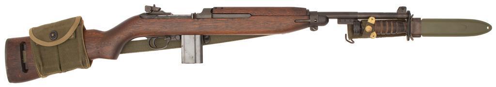 **IBM US M1 Carbine: .30 carbine caliber, 18" barrel, S/N 3868205. Parkerized finish with sanded low-wood stock featuring rounded sling slot. Late type rear sight with late barrel band and switch safety. Barrel shows 