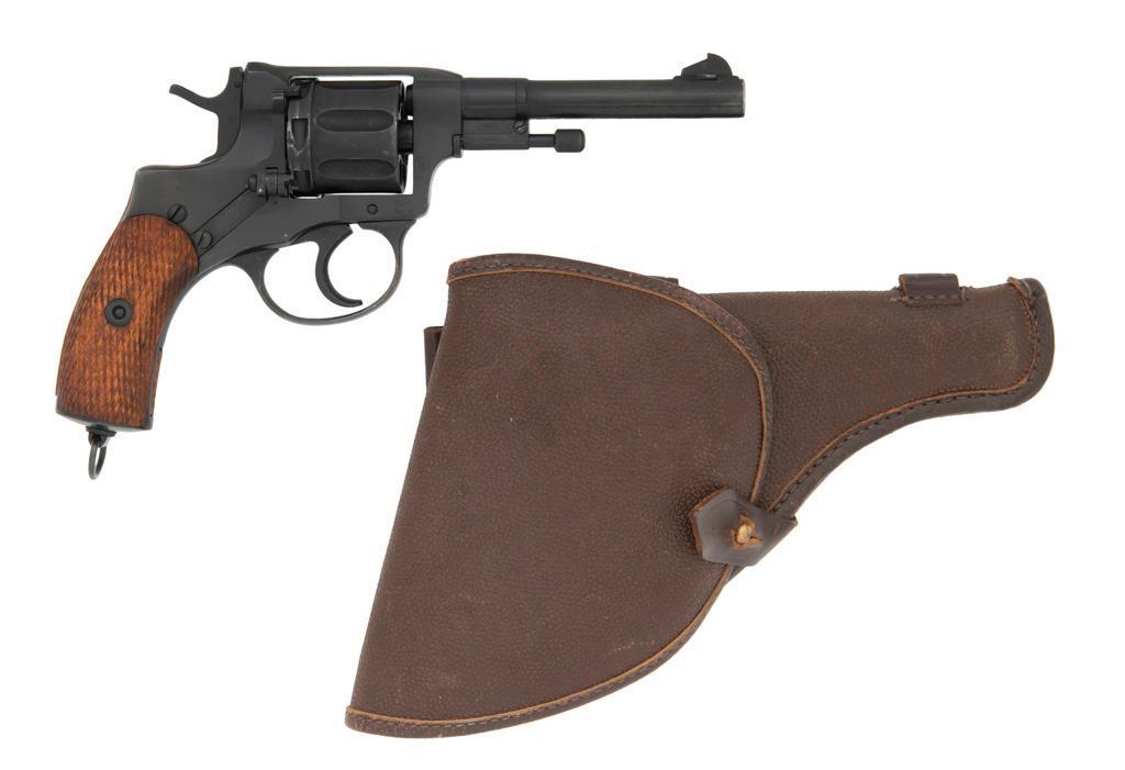 **Tula Soviet Russian Model 1895 Nagant Revolver: 7.62X38mmR caliber, 4.5" barrel, S/N 40109. Factory reblued finish with checkered wood grips. Seven-shot cylinder. Frame marked with Tula arrow and 1930 production date. Includes holster. **Very g