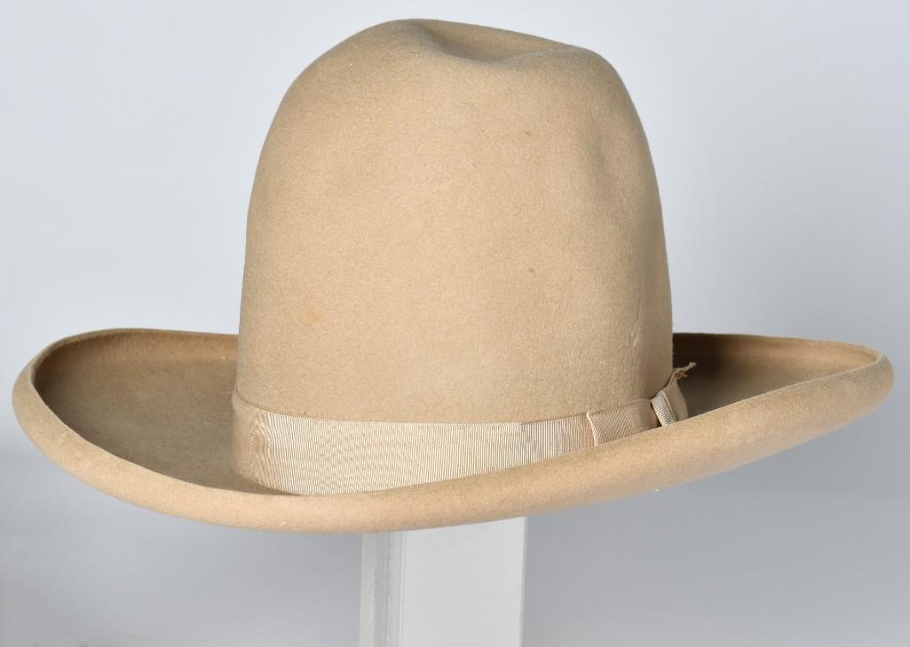 Merrimac Western Hat Attributed to Bill Pickett: Internal diameter 6.25" x 7.25". 3.25" brim, crown height 7". Unbound pencil-rolled brim with 1.25" grosgrain ribbon. leather sweatband with Merrimac maker's stamp, matching stamp in body. **Fine cond