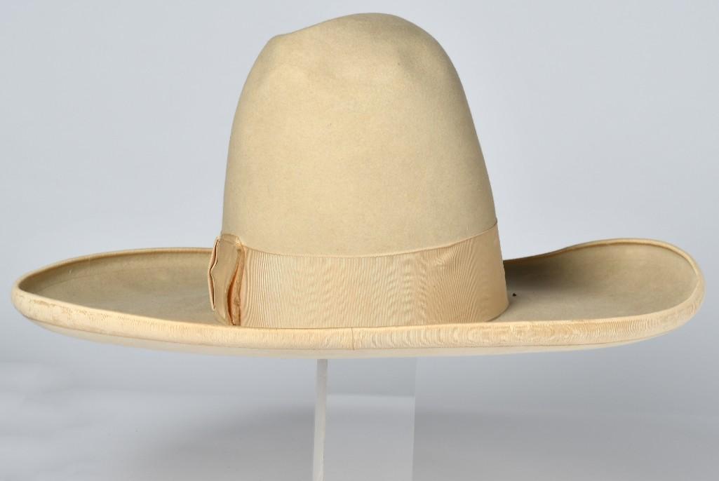 Vintage Stetson Western Hat Attributed to Bill Pickett: Internal diameter 6.25" x 7.5", brim 4.5", crown height 7". Nutria construction with bound brim and 2" grosgrain ribbon. Leather sweatband with Stetson stamp and "^/4 Ranch". Silk lining with retail m