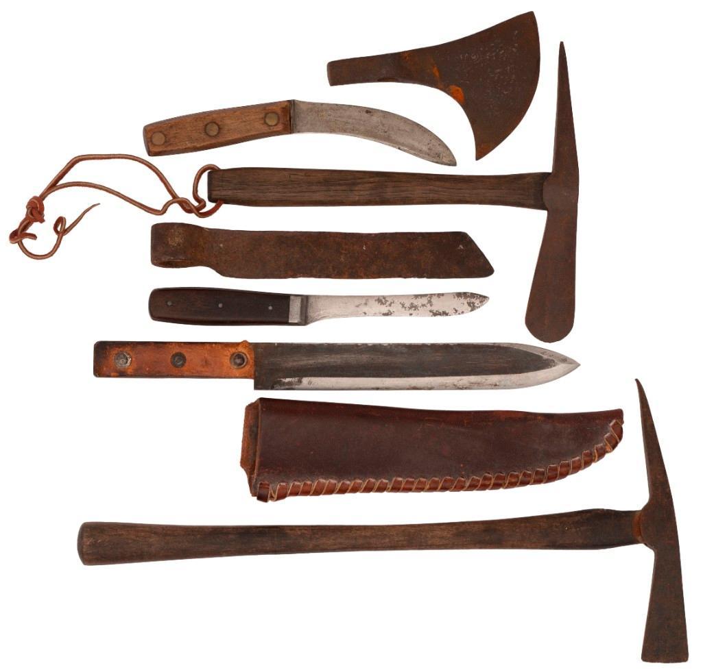 Lot of Trade Knives and Axes: Lot includes a selection of trade axes and blades, the largest measuring 17" x 8.5". **Fair condition overall. Some scattered oxidation and light pitting throughout. Some drying of wood from age.** $1