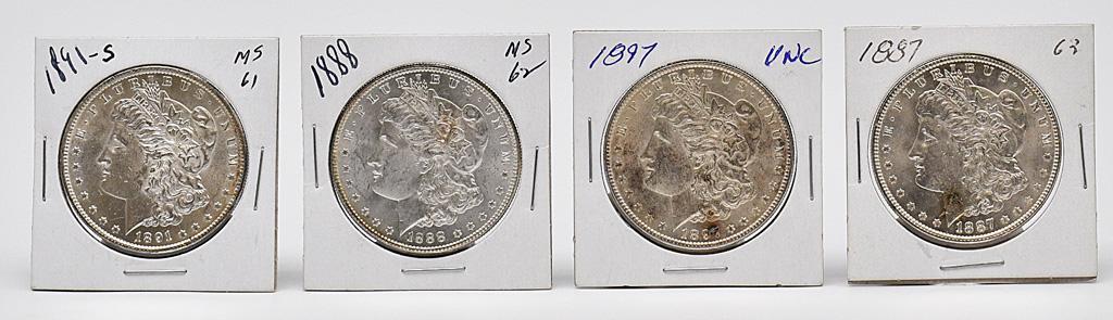 A Group of Four Silver Morgan One Dollar Coins (1 of 2)