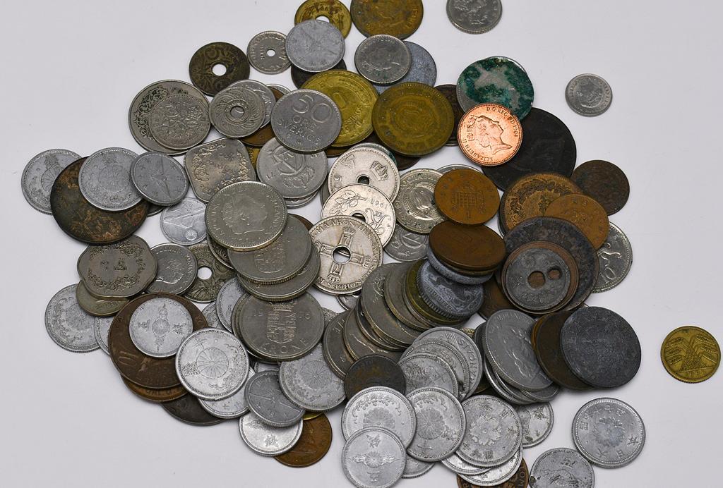 Group of International Coins from Japan, Nederlands, & Danmark: Large grouping of 20th Century coins from various countries including Japan, Great Britain, Myanmar, & others.
