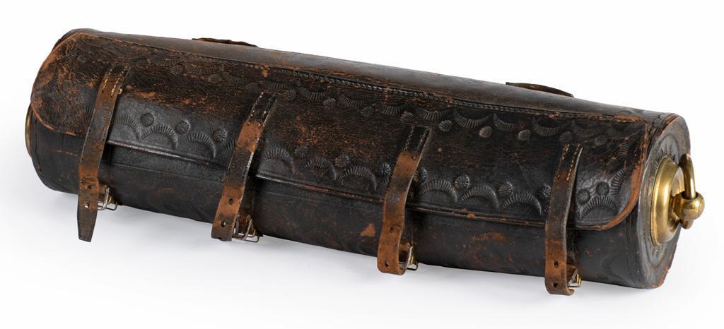 Leather Saddle Valise Attributed to Confederate General John Bell Hood: A leather saddle valise attributed to Confederate General John Bell Hood, leather case tooled with crescent and pinwheel design throughout, having brass handled ends, 17 x 5 inches. $2,000 - $4,000