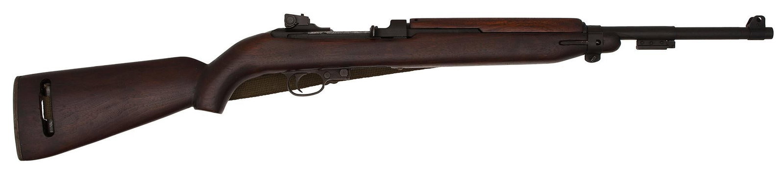 **U.S. Model M1 Carbine By Quality Hardware: .30 carbine caliber, 18" barrel, S/N 1651977. Barrel marked behind the front sight "Inland Div General Motors Div 2-44". Early stock with canvas sling. Carbine is excellent overall. The bore is bright