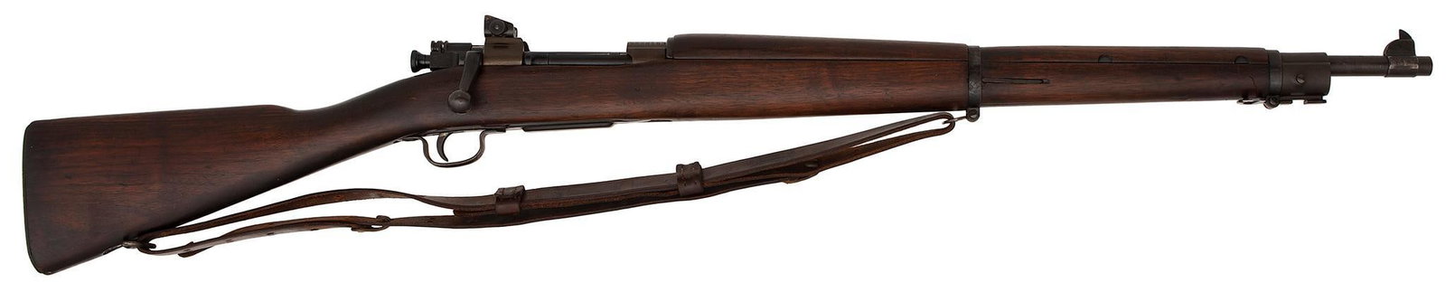 **U.S. Model 1903-A3 Remington Rifle: .30-06 caliber, 24" barrel, S/N 3558153. Barrel marked behind the front sight "RA flaming bomb 3-43". Barrel and receiver is has parkerized finish with a blue bolt. Walnut stock and handguard with a s
