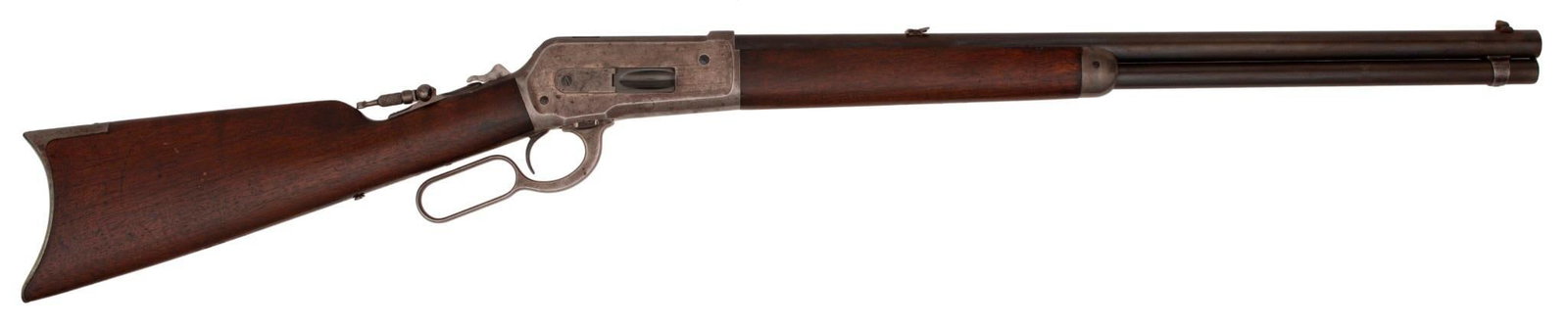 Winchester Model 1886 Rifle: 40-70 caliber, 26" octagonal barrel, S/N 71803, full magazine, blue barrel and magazine. Case colored frame. Select walnut stock and forearm. The barrel is gray to brown with some traces of blue finis