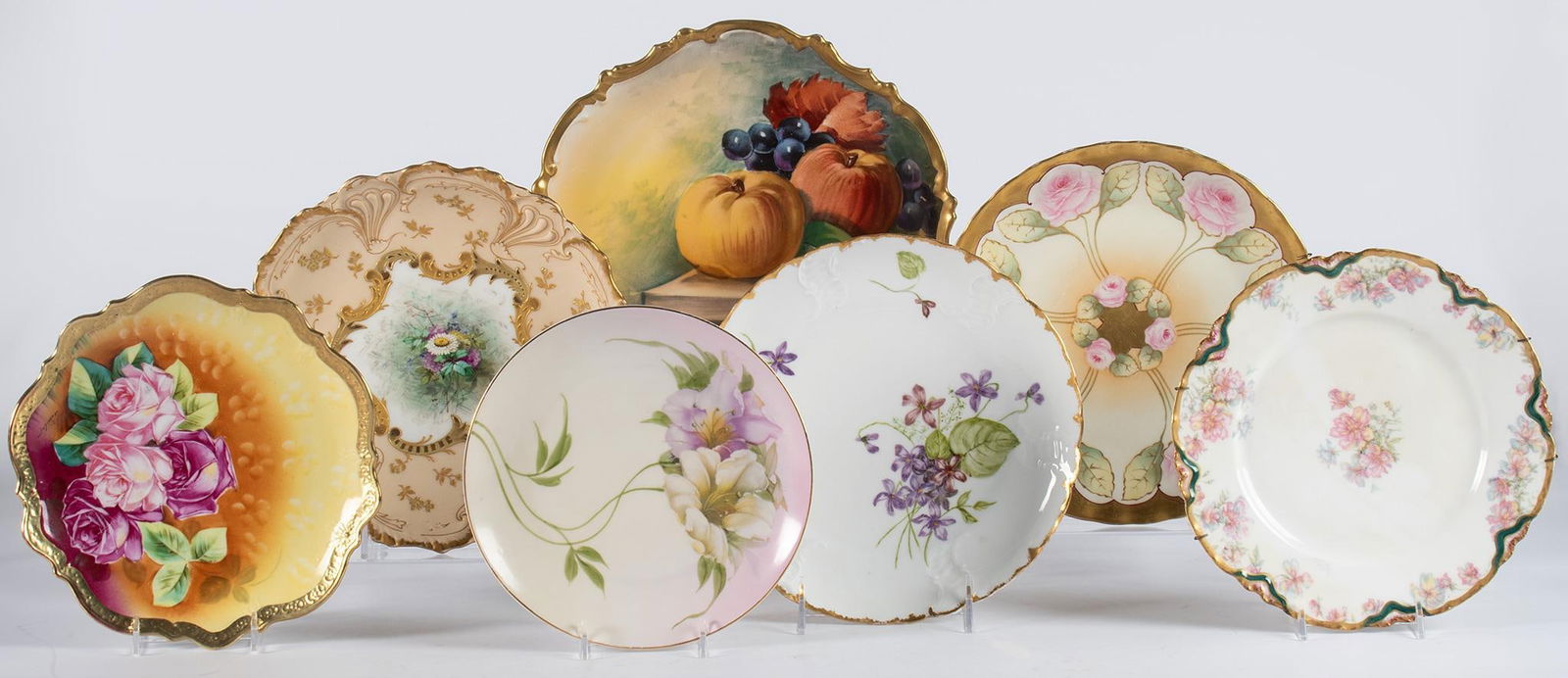 A Grouping of 7 French Porcelain Plates Limoges and Sevres (1 of 4)