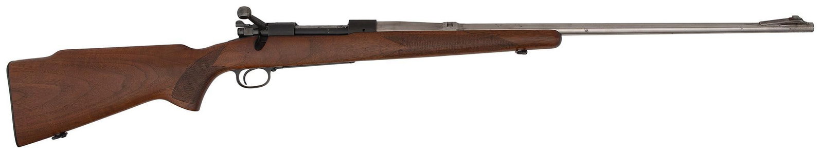 **Winchester Model 70 Rifle: .220 swift caliber, 26" Barrel, S/N147582, Complete rifle, the barrel is in the white and not properly set in the receiver. Walnut checkered stock is excellent. The receiver is matted blue and retains