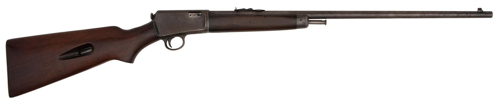 **Winchester Model 63 Rifle: 22 caliber, 23" round barrel, S/N 112213A, blue finish with walnut stock and forearm. Overall very good retaining some of the blue finish. Stock and forearm are in very good. The bore is bright and sh