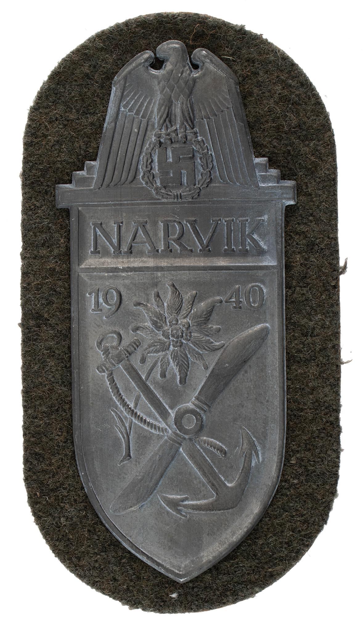 German WWII Kreigsmarine NARVIK Sleeve Shield: Mounted on Green cloth . Excellent condition overall.