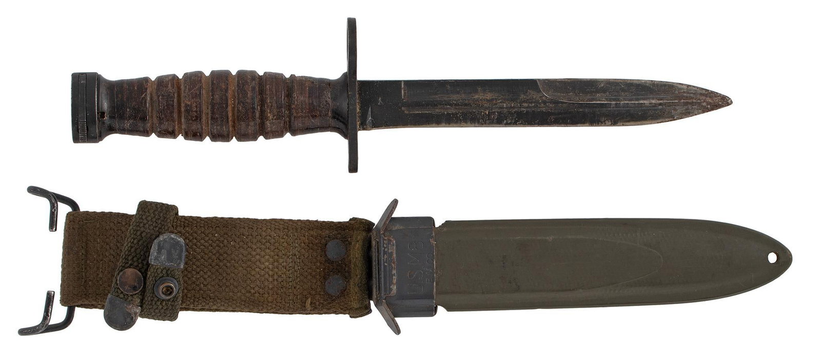 U.S. M-8 Bayonet: 6.75" spear point blade, Marked on the throat of the scabbard U.S. M 8 B.M. Co The blade has been sharpened. Overall very good condition.