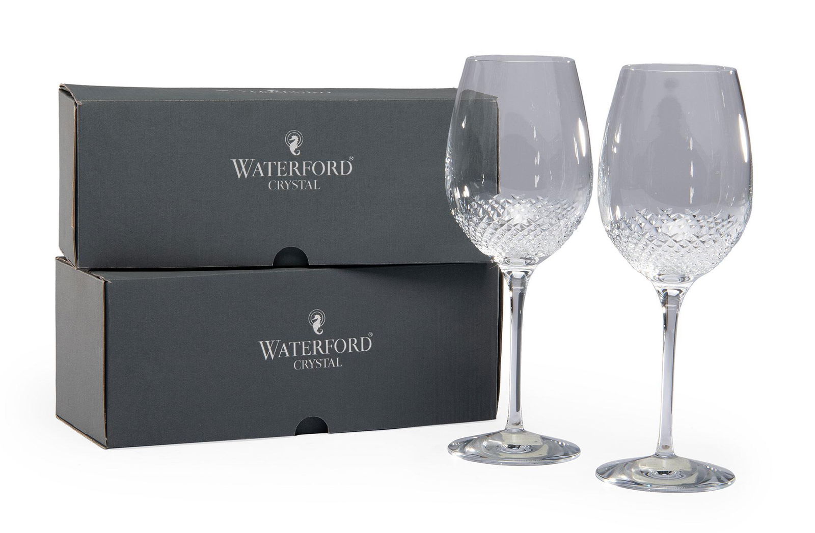 10 Waterford Crystal Alana Essence Red Wine Stemware: American, 20th century. A group of 10 Alana Essence goblets or red wine crystal stemware pieces by Waterford, each in original boxes; ht. 10.75 inches. Overall like new condition.