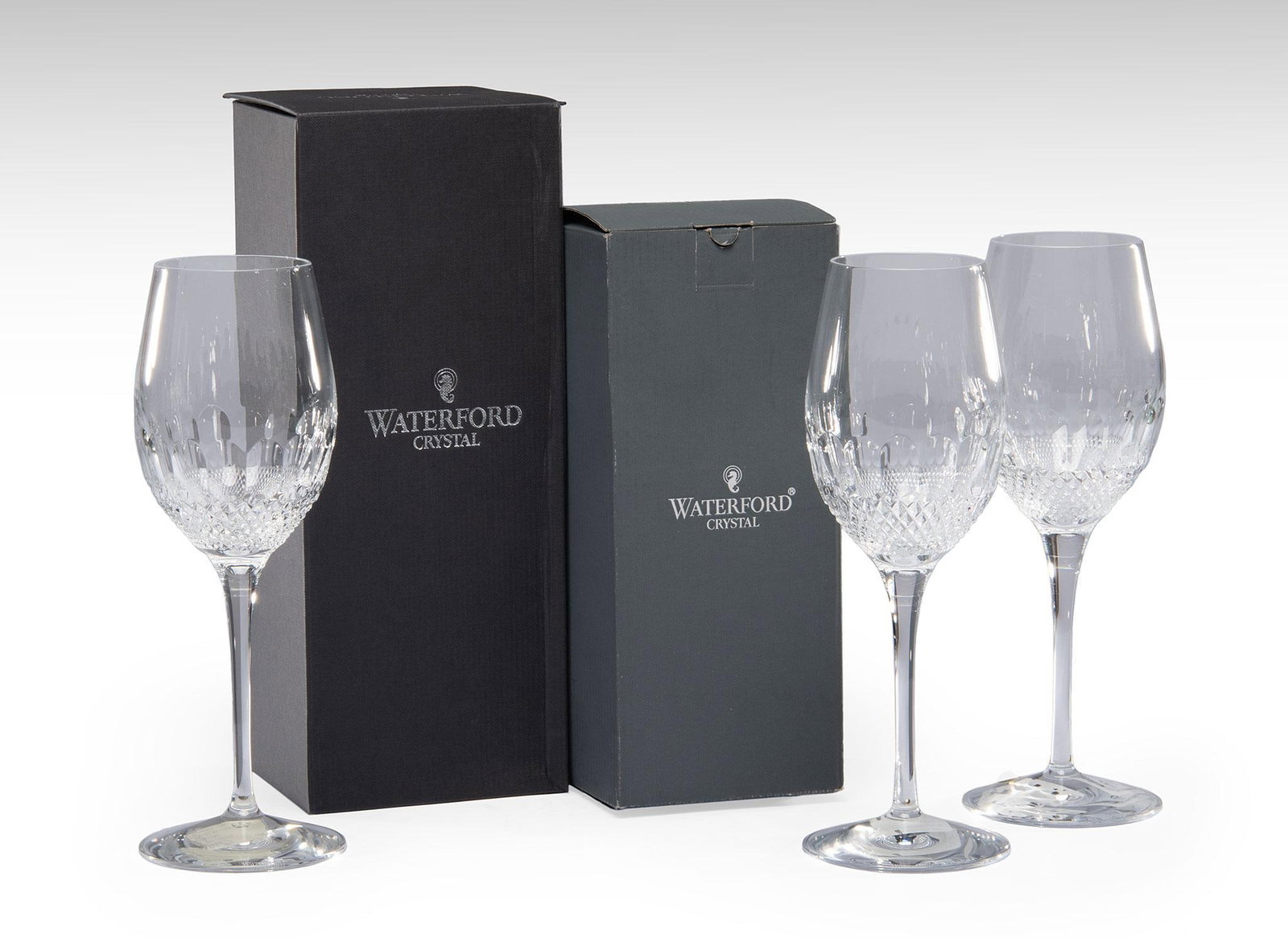 12 Waterford Crystal Colleen Essence Stemware Pieces: American, 20th century. A group of 12 Colleen Essence Waterford crystal stemware items, lot includes 10 white wine and 2 red wine crystal stemware pieces, each in original boxes; largest ht. 10 inches