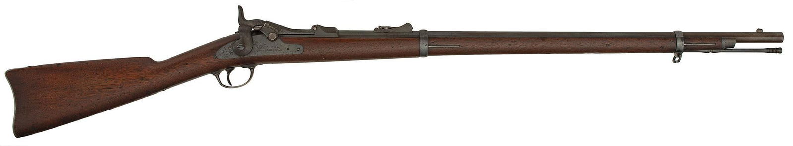 U.S. Model 1877 Springfield Trapdoor Cadet Rifle: 45-70 Caliber, 29.5" barrel, S/N 82819, Large V P Eagle barrel proofs, 77 rear barrel sight, Top of receiver marked with a "5". Top of the comb of stock near the buttplate with cadet markings. Walnut