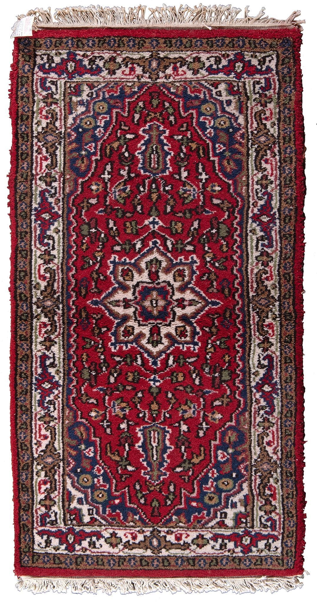An Indo-Persian Isfahan Rug: Persian, 20th century; 55 x 28 inches. Overall good condition.