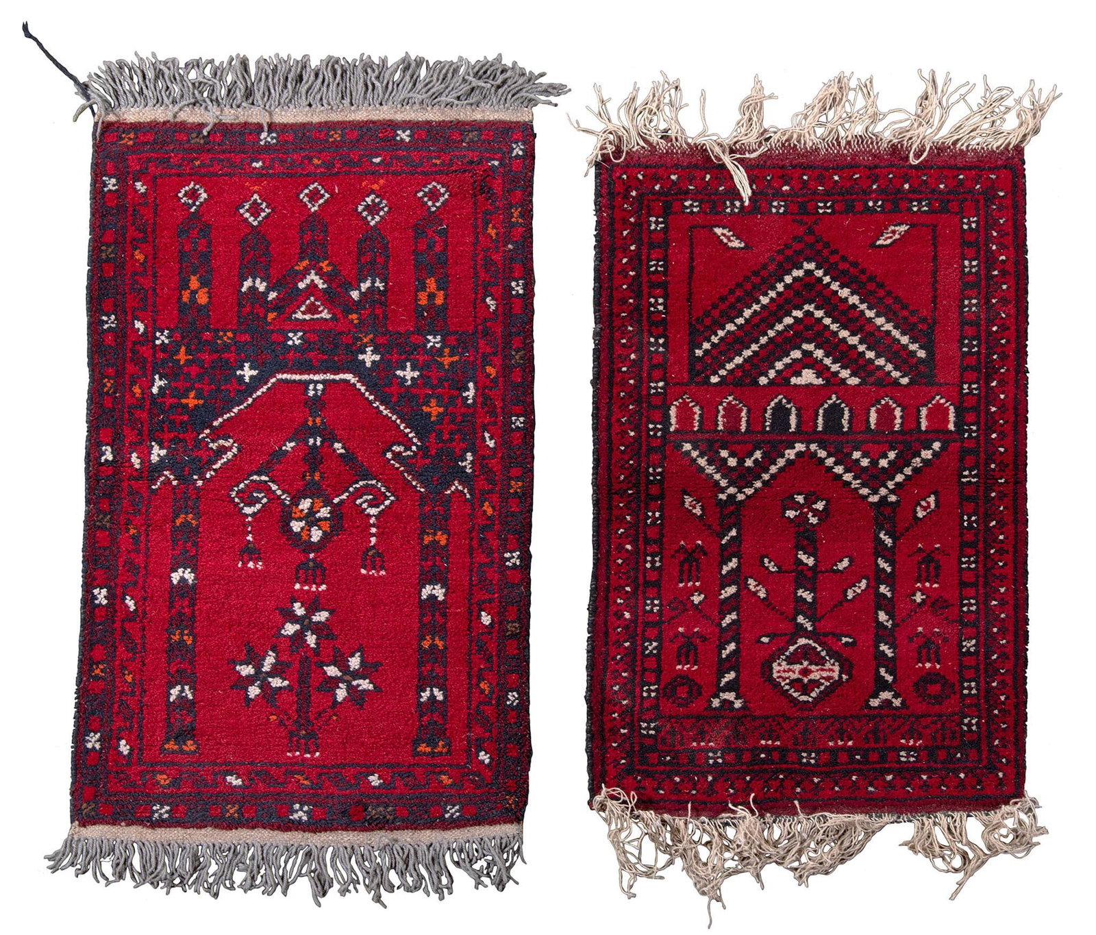 Two Beluchi Area Rugs: Iran, 20th century; 46 x 28 inches. Overall good condition.