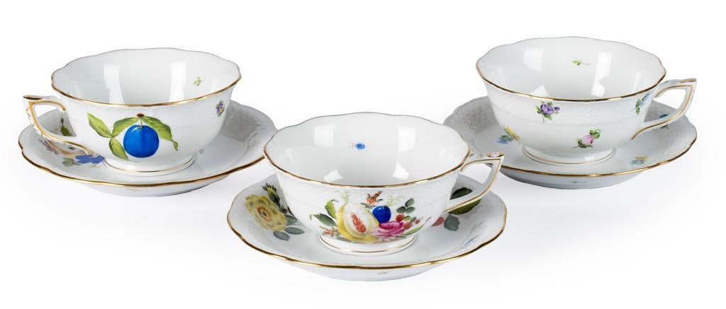 A Group of Three Herend Porcelain Teacups & Saucer: Hungarian, 20th century. A grouping of three various patterned Herend teacups and saucers, each with basket weave design and wildlife decor, all with hallmark on base; ht. 2.5, dia. 5.5 inches. Overal