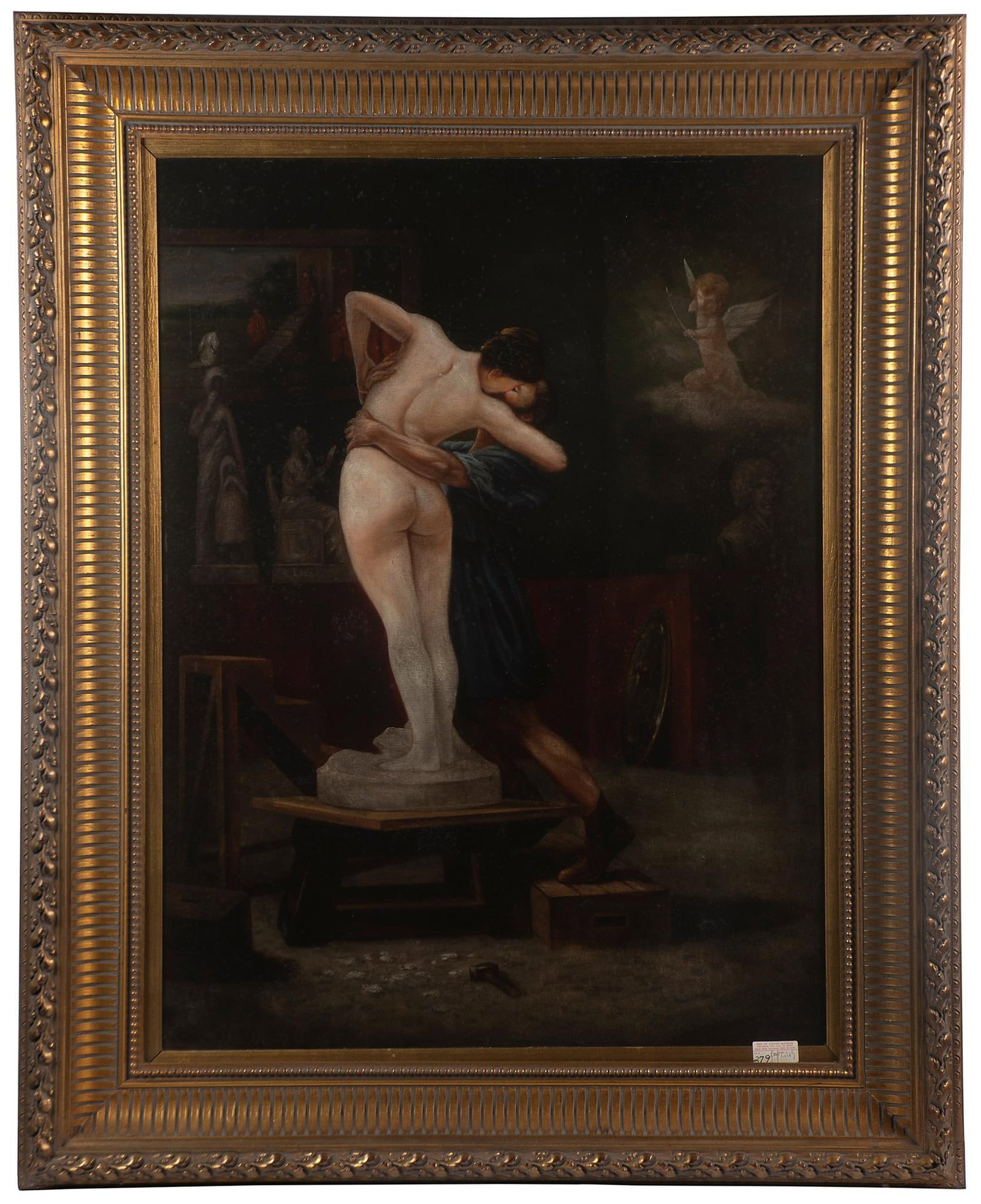 A 20th Century Oil on Canvas of Sculptor and Model: interior scene of sculptor kissing model oil on canvas unsigned 29 x 40 inches (sight) 42 x 52 inches (frame) Overall good condition with staining throughout and craquelure Provenance: Den of Stevens 