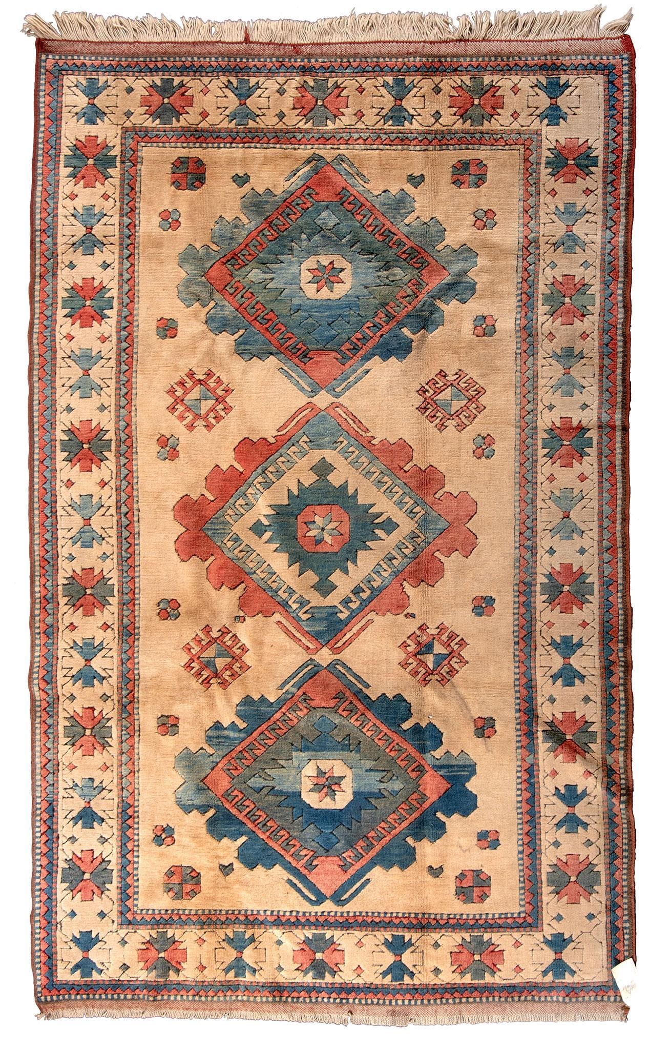 A Caucasian Kazak Area Rug: Kazak area rug, 20th century. 96 x 60 inches.
