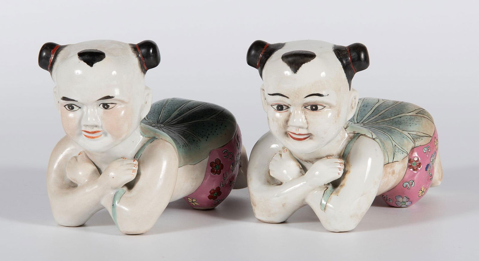 A Pair of Chinese Polychrome Decorated Figural Porcelain Pillows (1 of 3)