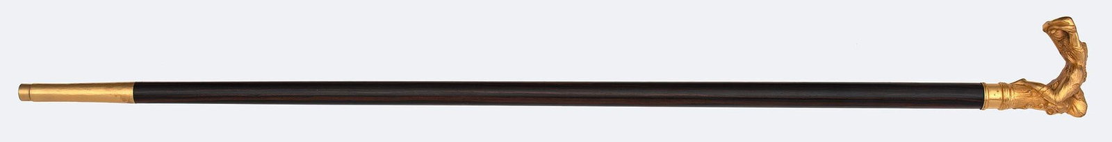 Rosewood and Figural Ormolu Handled Cane: American, 19th century. A rosewood walking cane, having a figural resting nude ormolu handle; ht. 36 inches. Overall good condition.