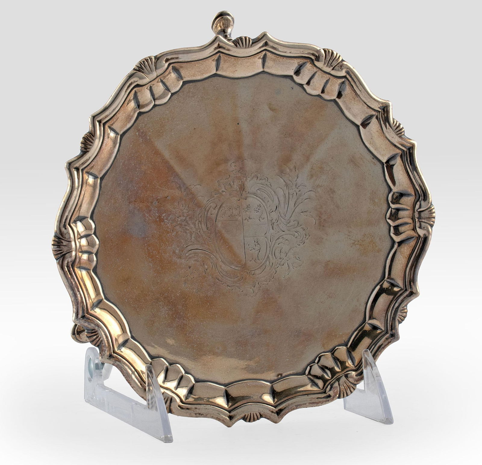 George II Silver Salver by Robert Abercrombie: English, mid 18th century. A George II period footed silver salver with Robert Abercrombie of London hallmarks to base, having a delicate shell design to the scalloped edge perimeter with central engr