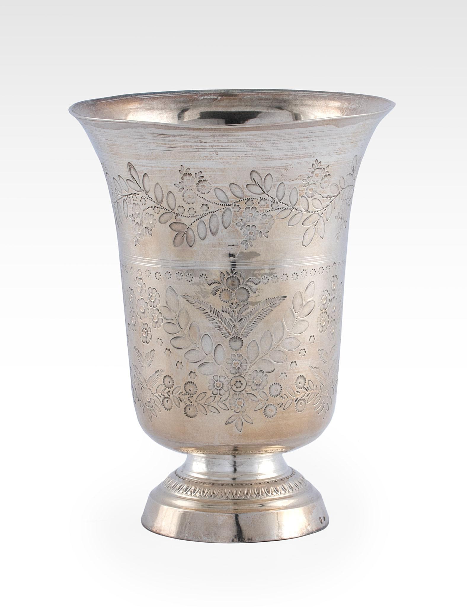 18th Century French Silver Tulip Wine Goblet by Claude Charvet: French, circa 1740. A silver tulip wine goblet, Claude Charvet hallmark to base, tulip shape with round step molded foot, body with chiseled garland decoration throughout; ht. 5.5 x dia. 4.25 inches.