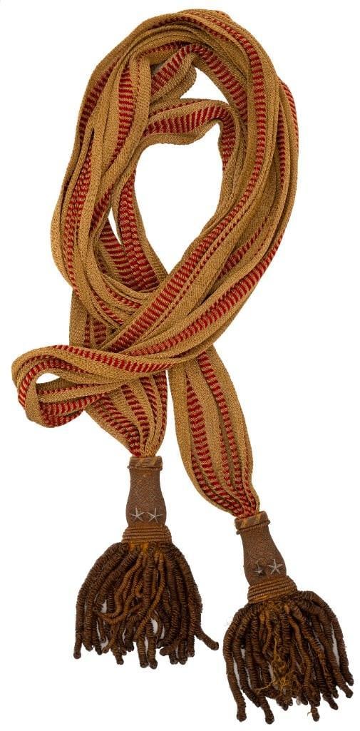 High Quality Civil War Major General Officer's Silk Sash: A heavy gold silk general officers dress sash having five machined rows of integral red brocade woven in a horizontal diced pattern. With two gold tassels, each having two applied silver stars on eith