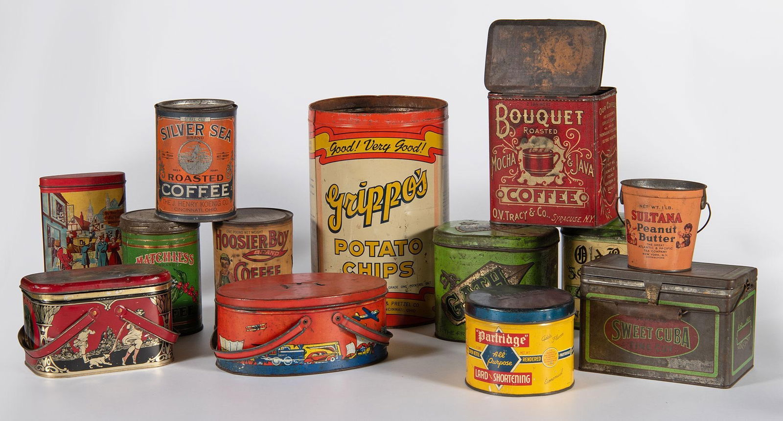 A Group of Vintage Painted Tin Advertisement Cans (1 of 2)