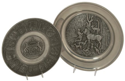 Two German Pewter Relief Decorated Plates