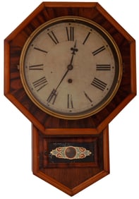 A Mahogony and Pine Welchhsprings & Company Hanging Wall Clock