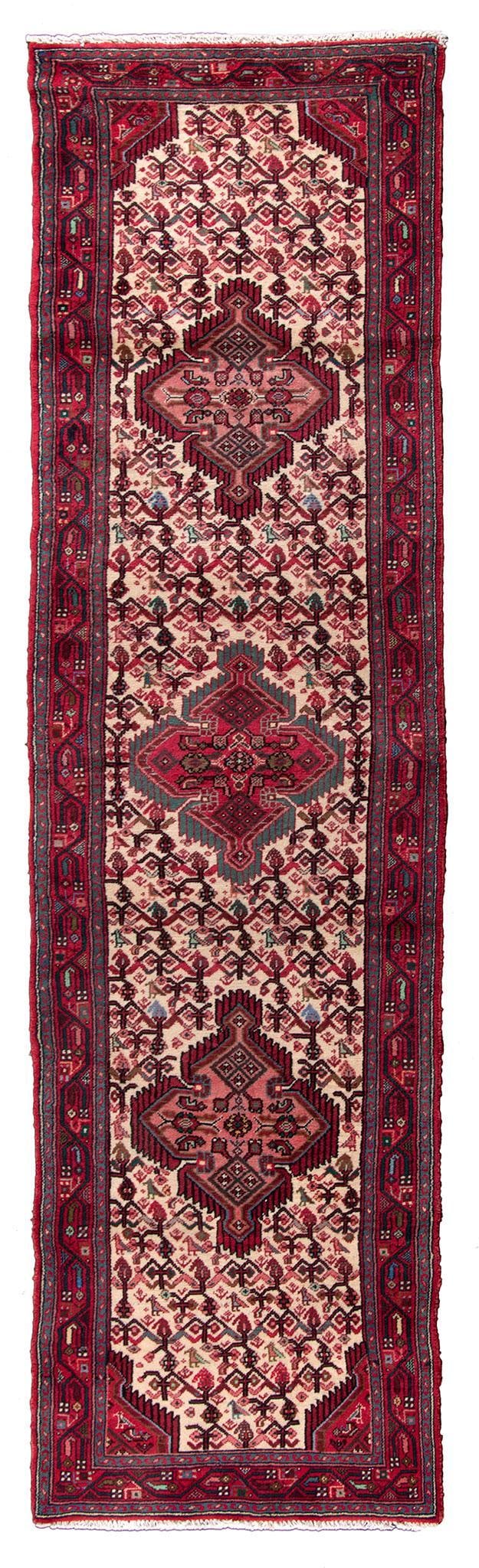 A Persian Hussainabad Runner Area Rug: Iran, 20th century ht. 118 x 31 inches. Overall good condition.