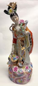 A Chinese Polychrome Decorated Figural Porcelain Sculpture