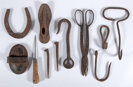 A Group of Antique Wrought Iron Farm Tools