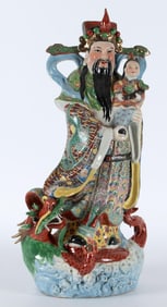 A Chinese Polychrome Porcelain Immortal Figure with Child