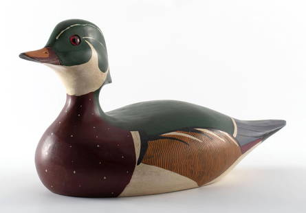 Vintage Wooden Carved and Painted Duck Decoy by J.P. Selmants: A vintage hand carved and hand painted duck decoy. The decoy is titled, signed and dated Wood Duck J.P. Selmants 10/01 and marked Duxbury Decoys J.P. Selmants Medina, Ohio; ht. 6, wd. 11, dp. 5 inches