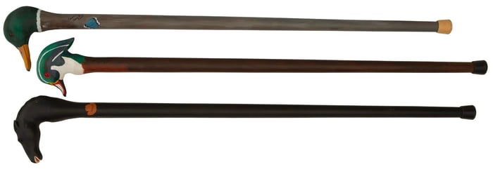 A Group of Three Wildlife Carved Canes