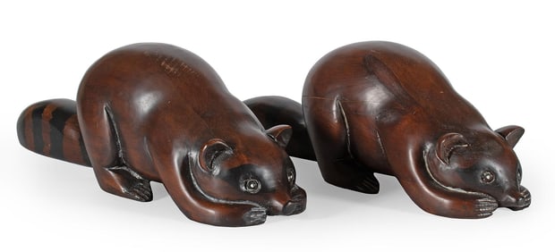 A Pair of Folk Art Carved Raccoons