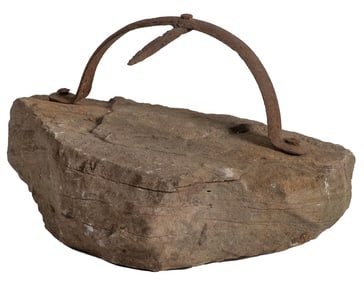 A Wrought Iron and Stone Tennessee Boot Scrape