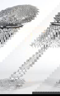 Very Fine American Brilliant Cut Glass Mushroom Table Lamp: American, 20th century. ABCG table lamp with mushroom shade, very fine hobstar cut, bullseye and fan highlights, complete with prisms along silver plated support, electrified, ht. 24, dia. 12 inches.